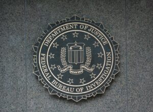 the seal of the department of justice on a wall