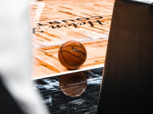 NBA 季中錦標賽 brown basketball on brown wooden floor